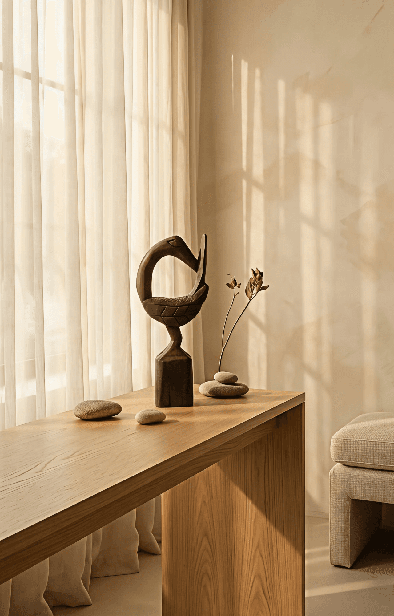 Sankofa bird sculpture in a serene, sunlit interior setting